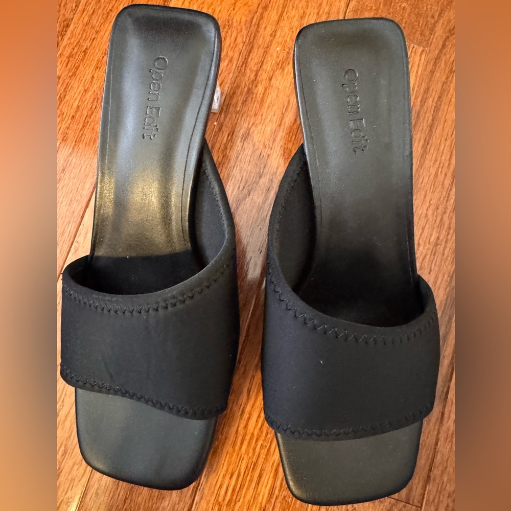 Open edit black heels. Open back